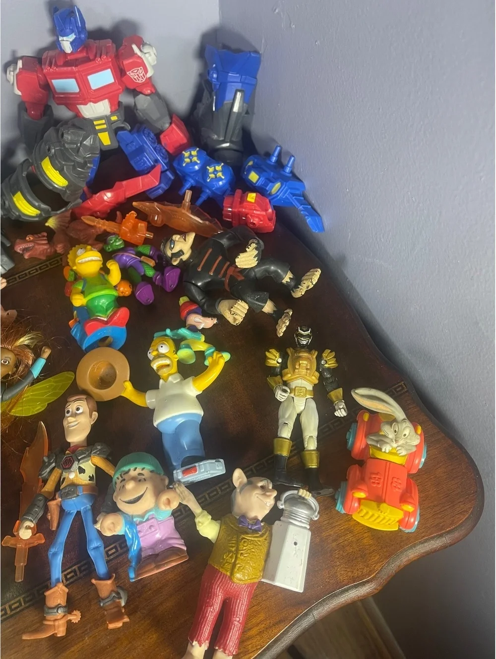 Mixed Lot of Vintage and Modern Action Figures Including Transformers, Simpsons,